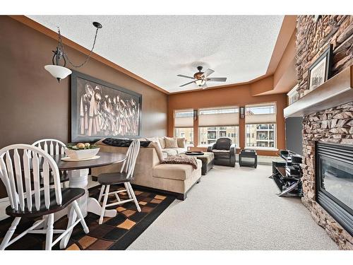 540-10 Discovery Ridge Close Sw, Calgary, AB - Indoor With Fireplace