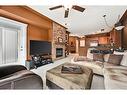 540-10 Discovery Ridge Close Sw, Calgary, AB  - Indoor Photo Showing Living Room With Fireplace 