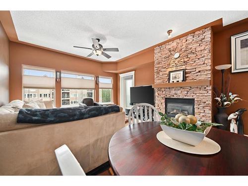 540-10 Discovery Ridge Close Sw, Calgary, AB - Indoor With Fireplace