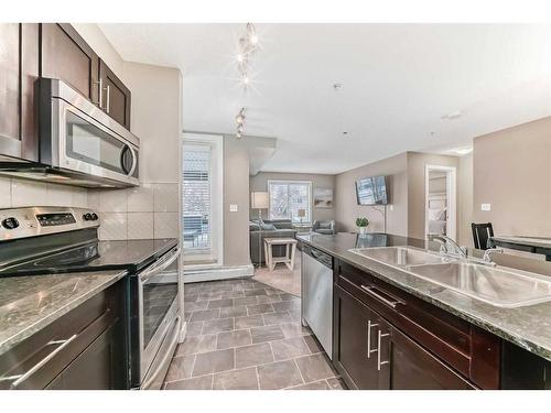 3101-1317 27 Street Se, Calgary, AB - Indoor Photo Showing Kitchen With Stainless Steel Kitchen With Double Sink With Upgraded Kitchen