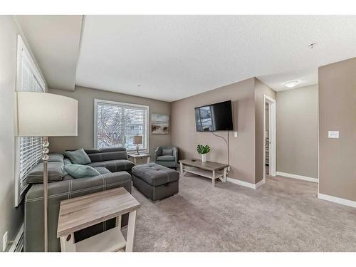 3101-1317 27 Street Se, Calgary, AB - Indoor Photo Showing Living Room