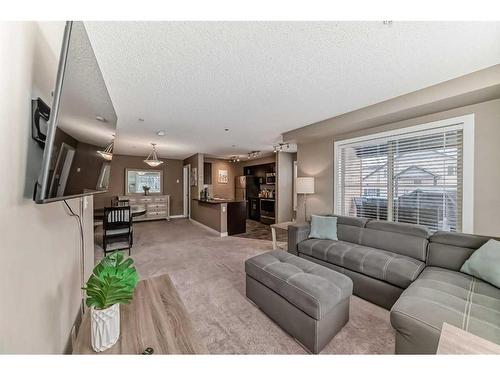 3101-1317 27 Street Se, Calgary, AB - Indoor Photo Showing Living Room