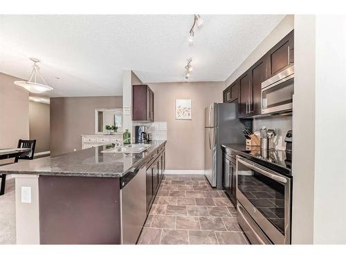 3101-1317 27 Street Se, Calgary, AB - Indoor Photo Showing Kitchen With Stainless Steel Kitchen With Upgraded Kitchen