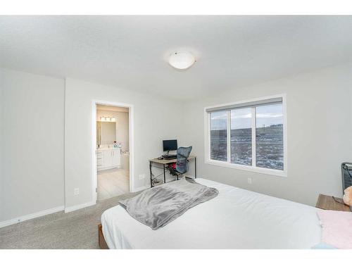 174 Carringsby Way Nw, Calgary, AB - Indoor Photo Showing Bedroom