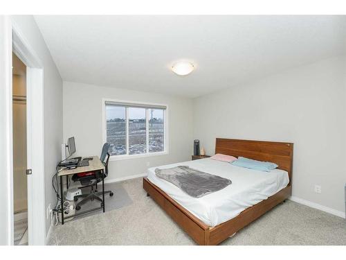 174 Carringsby Way Nw, Calgary, AB - Indoor Photo Showing Bedroom