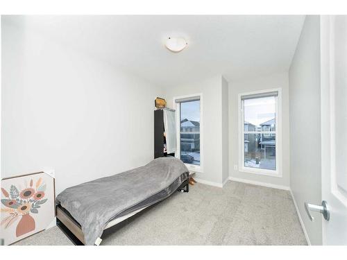 174 Carringsby Way Nw, Calgary, AB - Indoor Photo Showing Bedroom