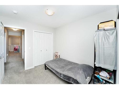 174 Carringsby Way Nw, Calgary, AB - Indoor Photo Showing Bedroom