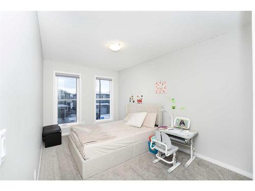 174 Carringsby Way Nw, Calgary, AB - Indoor Photo Showing Bedroom