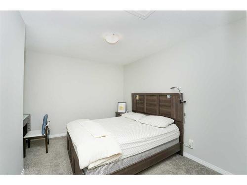 174 Carringsby Way Nw, Calgary, AB - Indoor Photo Showing Bedroom