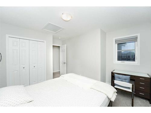 174 Carringsby Way Nw, Calgary, AB - Indoor Photo Showing Bedroom