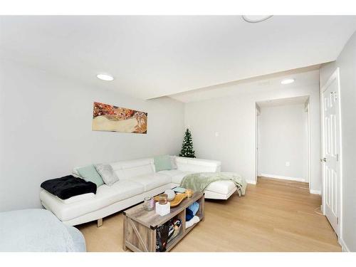 174 Carringsby Way Nw, Calgary, AB - Indoor Photo Showing Living Room