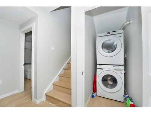 174 Carringsby Way Nw, Calgary, AB - Indoor Photo Showing Laundry Room