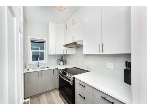 174 Carringsby Way Nw, Calgary, AB - Indoor Photo Showing Kitchen