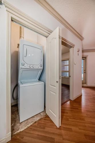 115-333 Riverfront Avenue Se, Calgary, AB - Indoor Photo Showing Laundry Room