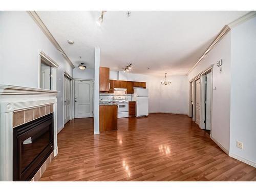 115-333 Riverfront Avenue Se, Calgary, AB - Indoor With Fireplace