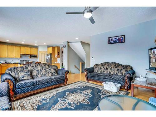 63 New Brighton Close Se, Calgary, AB - Indoor Photo Showing Living Room