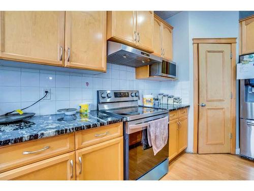 63 New Brighton Close Se, Calgary, AB - Indoor Photo Showing Kitchen