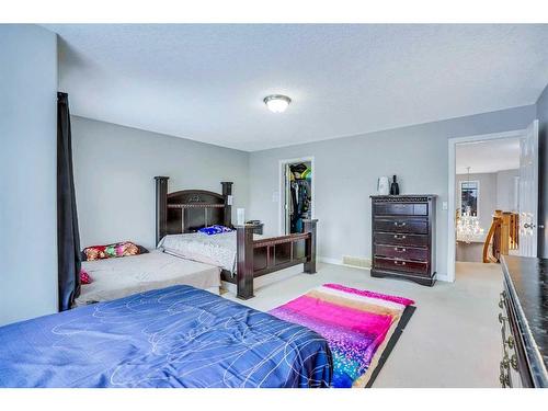 63 New Brighton Close Se, Calgary, AB - Indoor Photo Showing Bedroom