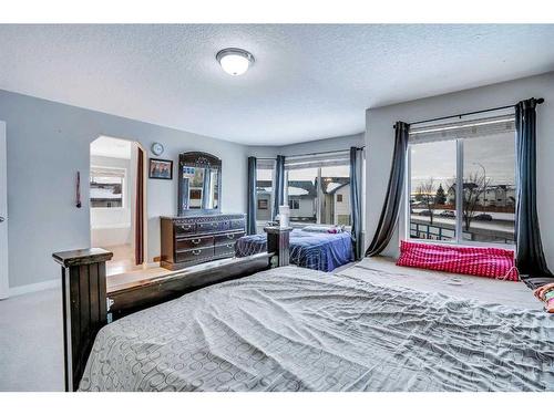 63 New Brighton Close Se, Calgary, AB - Indoor Photo Showing Bedroom