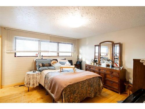 244 High Point Estates, Rural Rocky View County, AB - Indoor Photo Showing Bedroom