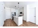 3407-111 Wolf Creek Drive Se, Calgary, AB  - Indoor Photo Showing Kitchen With Double Sink With Upgraded Kitchen 