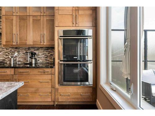 281 Kinniburgh Boulevard, Chestermere, AB - Indoor Photo Showing Kitchen