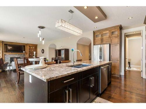 281 Kinniburgh Boulevard, Chestermere, AB - Indoor Photo Showing Kitchen With Double Sink With Upgraded Kitchen