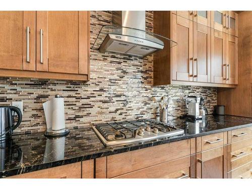 281 Kinniburgh Boulevard, Chestermere, AB - Indoor Photo Showing Kitchen