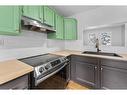 7-2210 Oakmoor Drive Sw, Calgary, AB  - Indoor Photo Showing Kitchen 