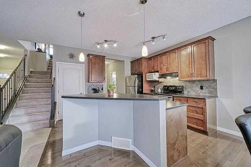 200 Saddlecrest Way Ne, Calgary, AB - Indoor Photo Showing Kitchen