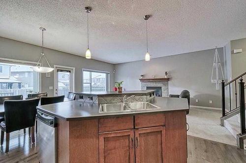 200 Saddlecrest Way Ne, Calgary, AB - Indoor Photo Showing Kitchen With Double Sink