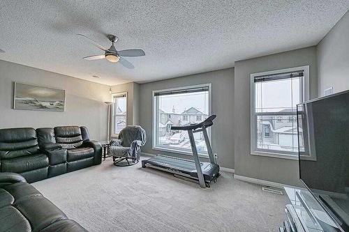 200 Saddlecrest Way Ne, Calgary, AB - Indoor Photo Showing Living Room