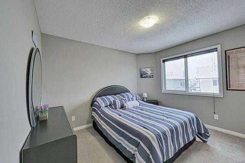 200 Saddlecrest Way Ne, Calgary, AB - Indoor Photo Showing Bedroom