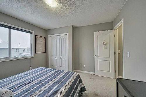 200 Saddlecrest Way Ne, Calgary, AB - Indoor Photo Showing Bedroom