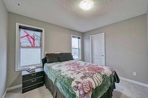 200 Saddlecrest Way Ne, Calgary, AB - Indoor Photo Showing Bedroom