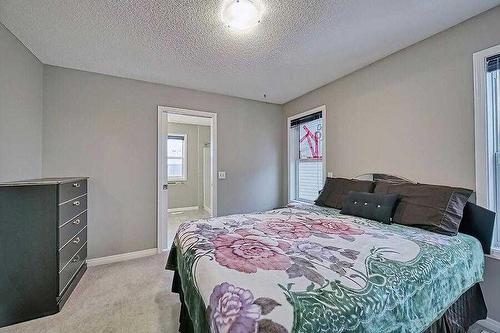 200 Saddlecrest Way Ne, Calgary, AB - Indoor Photo Showing Bedroom