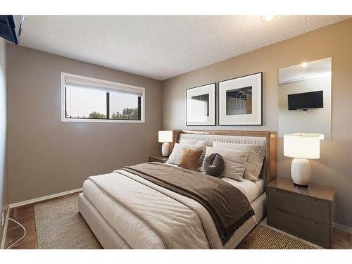 303 Lynnview Road Se, Calgary, AB - Indoor Photo Showing Bedroom