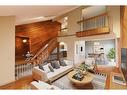 303 Lynnview Road Se, Calgary, AB  - Indoor Photo Showing Living Room 