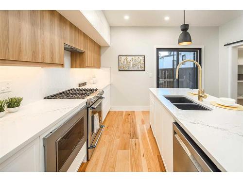 2630 Erlton Street Sw, Calgary, AB - Indoor Photo Showing Kitchen With Stainless Steel Kitchen With Double Sink With Upgraded Kitchen