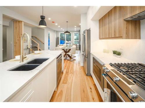 2630 Erlton Street Sw, Calgary, AB - Indoor Photo Showing Kitchen With Stainless Steel Kitchen With Double Sink With Upgraded Kitchen