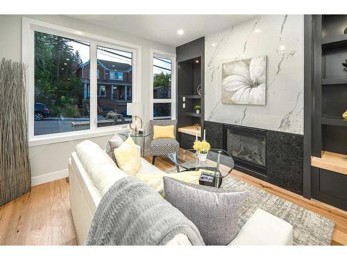 2630 Erlton Street Sw, Calgary, AB - Indoor Photo Showing Living Room With Fireplace