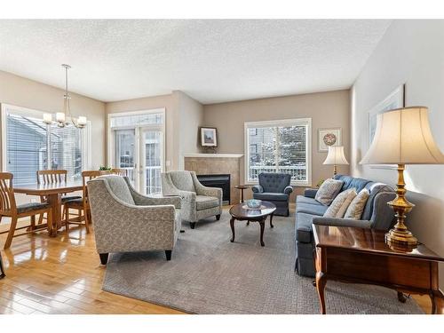 113 Tucker Circle, Okotoks, AB - Indoor Photo Showing Living Room