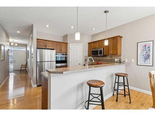 113 Tucker Circle, Okotoks, AB - Indoor Photo Showing Kitchen With Stainless Steel Kitchen With Upgraded Kitchen