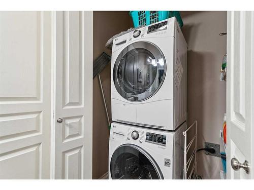 113 Tucker Circle, Okotoks, AB - Indoor Photo Showing Laundry Room