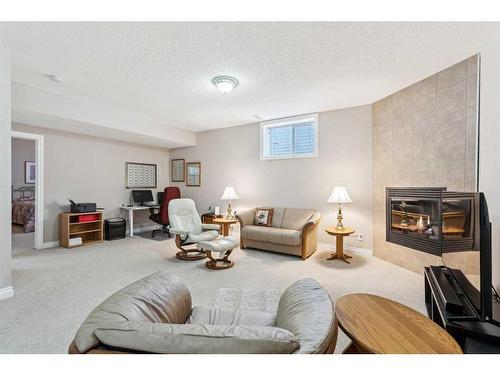 113 Tucker Circle, Okotoks, AB - Indoor Photo Showing Living Room