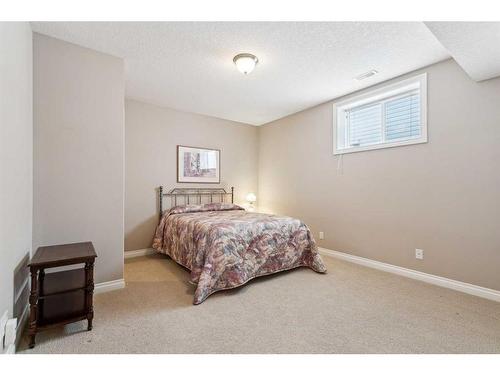 113 Tucker Circle, Okotoks, AB - Indoor Photo Showing Bedroom