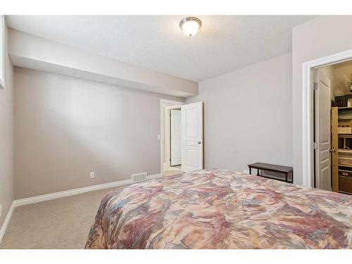 113 Tucker Circle, Okotoks, AB - Indoor Photo Showing Bedroom