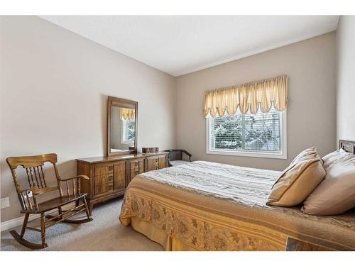 113 Tucker Circle, Okotoks, AB - Indoor Photo Showing Bedroom