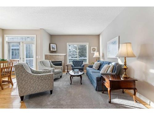 113 Tucker Circle, Okotoks, AB - Indoor Photo Showing Living Room