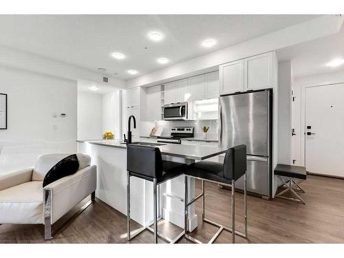 305-4138 University Avenue Nw, Calgary, AB - Indoor Photo Showing Kitchen With Stainless Steel Kitchen With Upgraded Kitchen